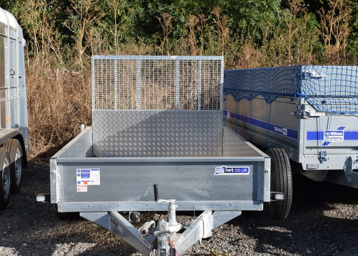 General duty utility trailer parked on a farm