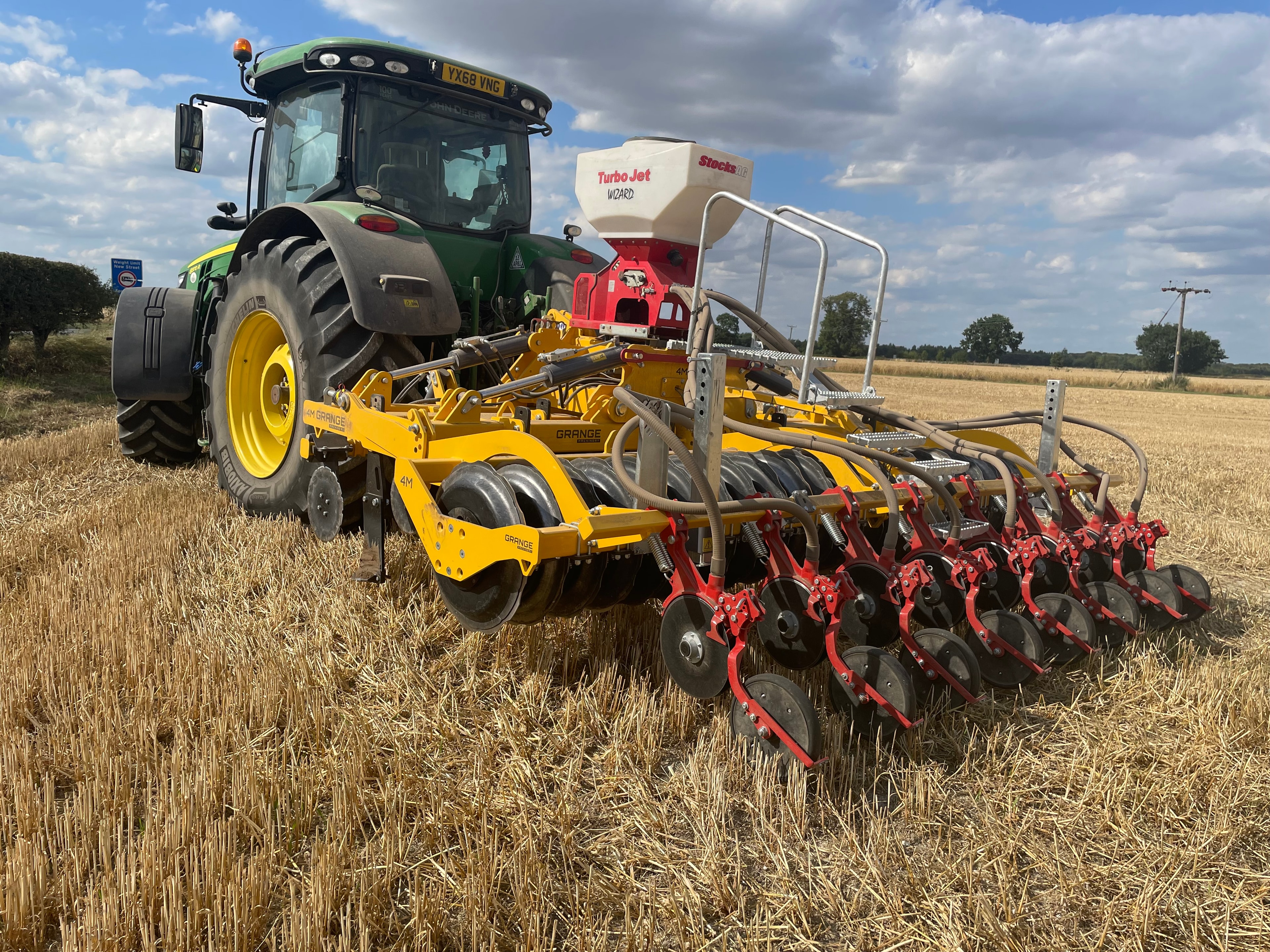 Agricultural implement hydraulic folding wing tractor field