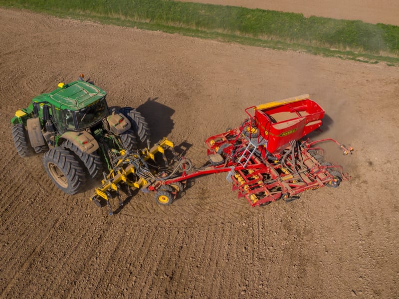Tractor implement headland turn folding wing