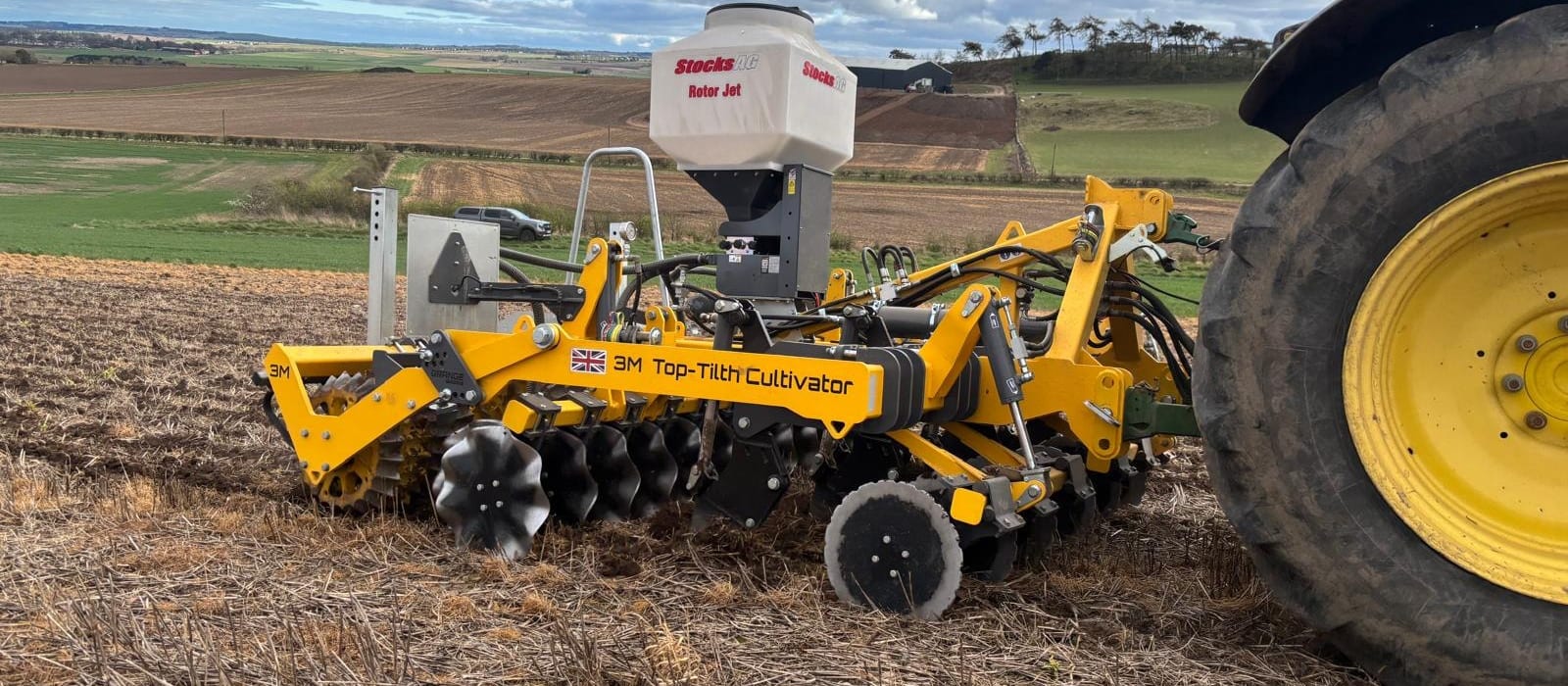 Top Tilth Cultivator working across a large field